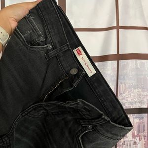 SOLD Levi’s Black Ripped Jeans with Logo Fabric 512 Slim Taper